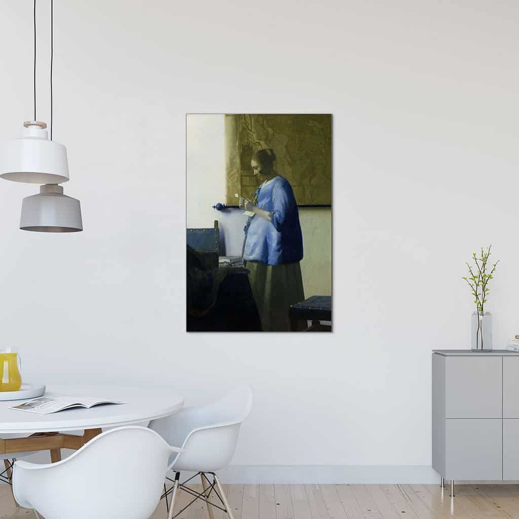 Vrouw in het blauw die een brief leest (Johannes Vermeer)