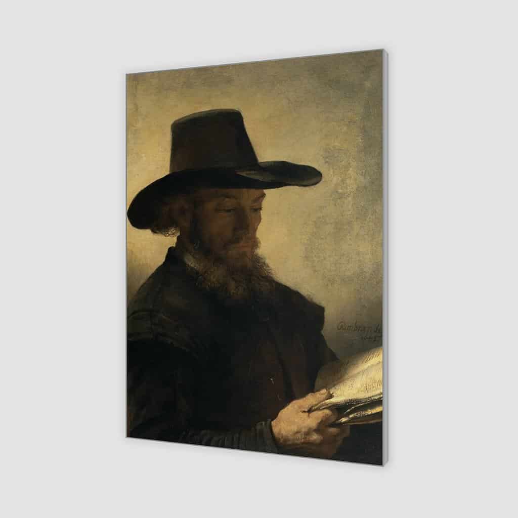 Portret van een man die bij kaarslicht leest (Rembrandt)