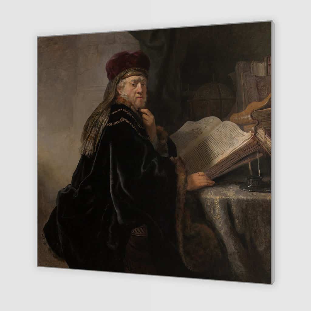 Geleerde, zittend aan een tafel met boeken (Rembrandt)