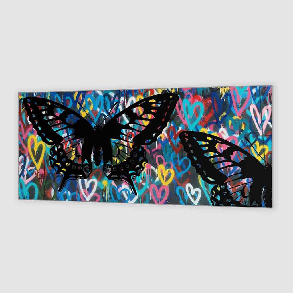 Stencil vlinders op de muur