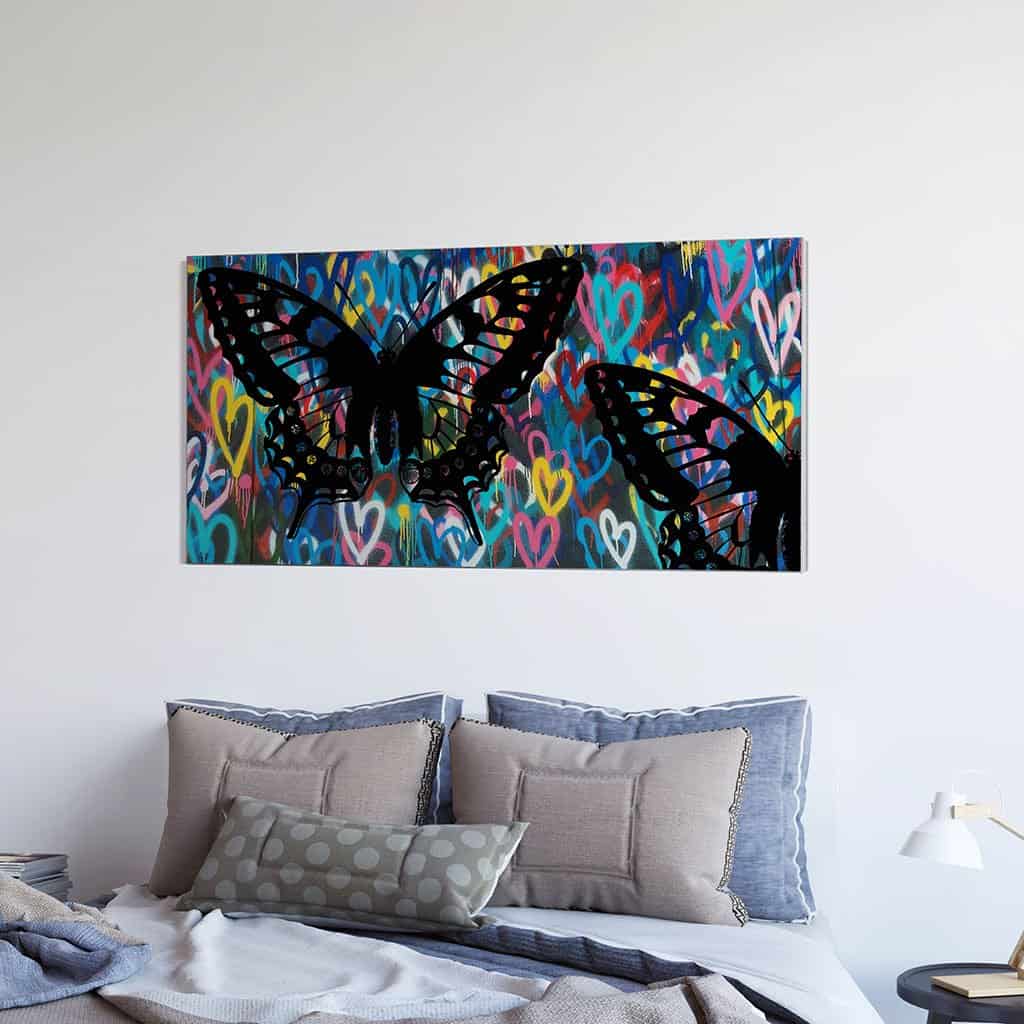 Stencil vlinders op de muur
