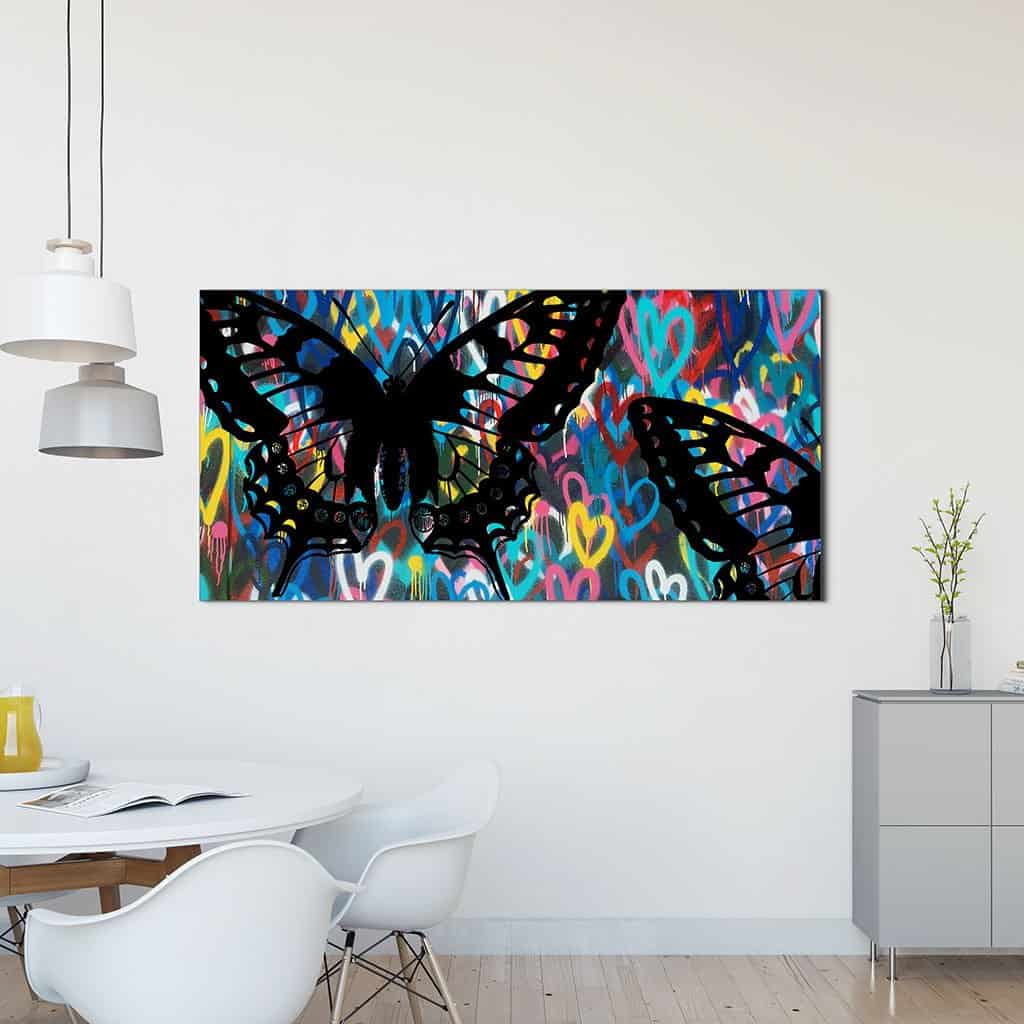 Stencil vlinders op de muur