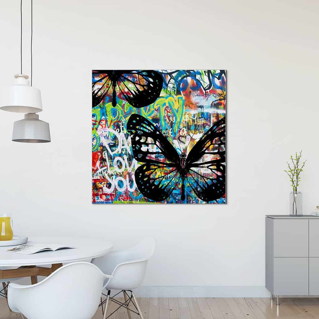 Vlinders op de graffiti muur