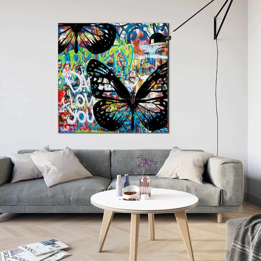 Vlinders op de graffiti muur