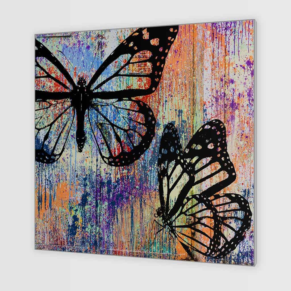 Stencil vlinders op de muur