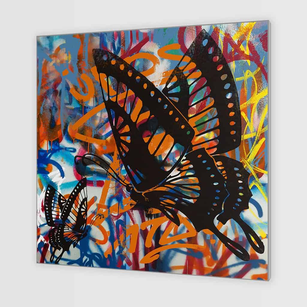Stencil vlinders op de muur