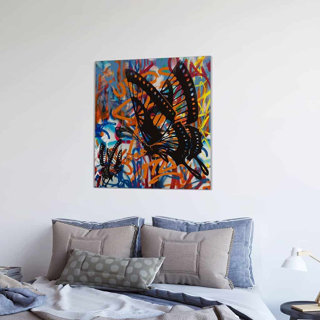 Stencil vlinders op de muur