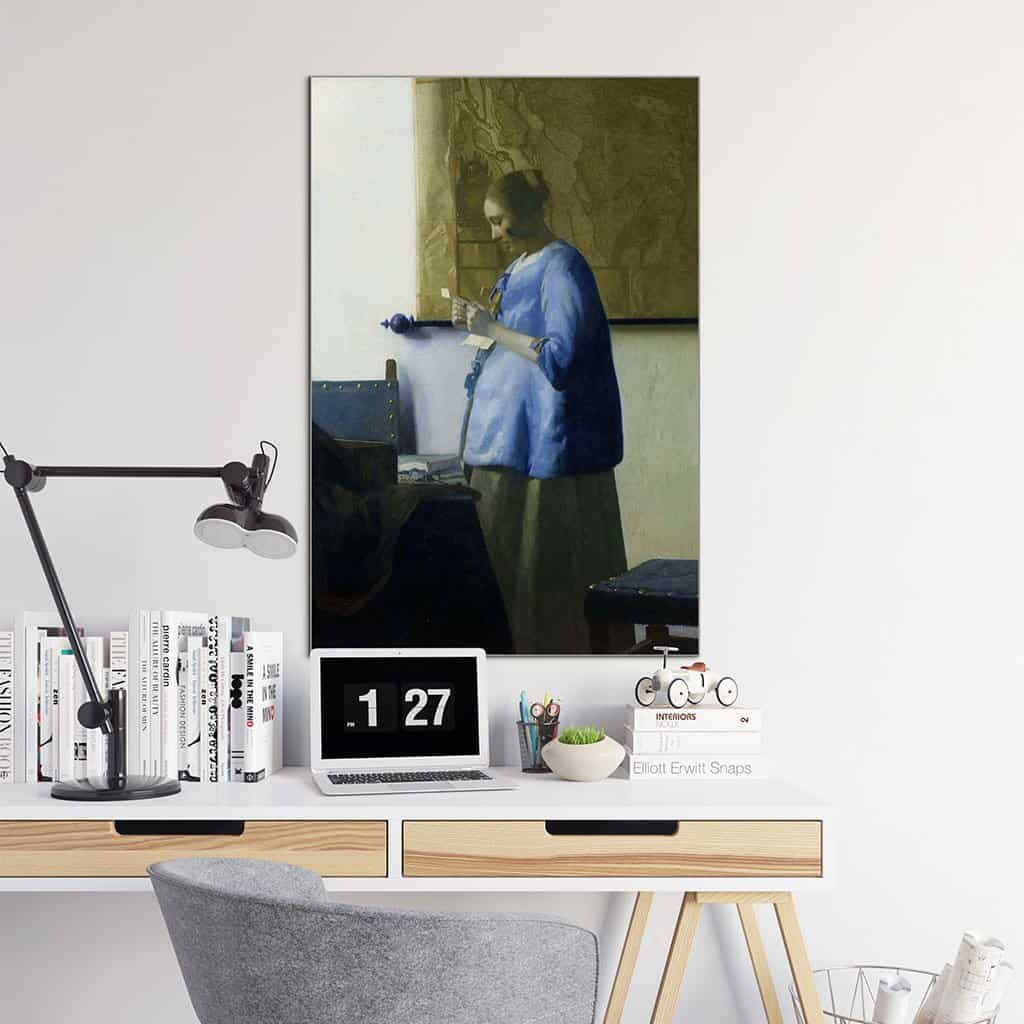 Vrouw in het blauw die een brief leest (Johannes Vermeer)