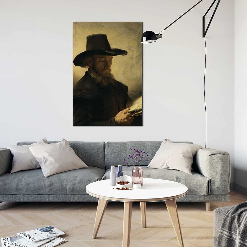 Portret van een man die bij kaarslicht leest (Rembrandt)