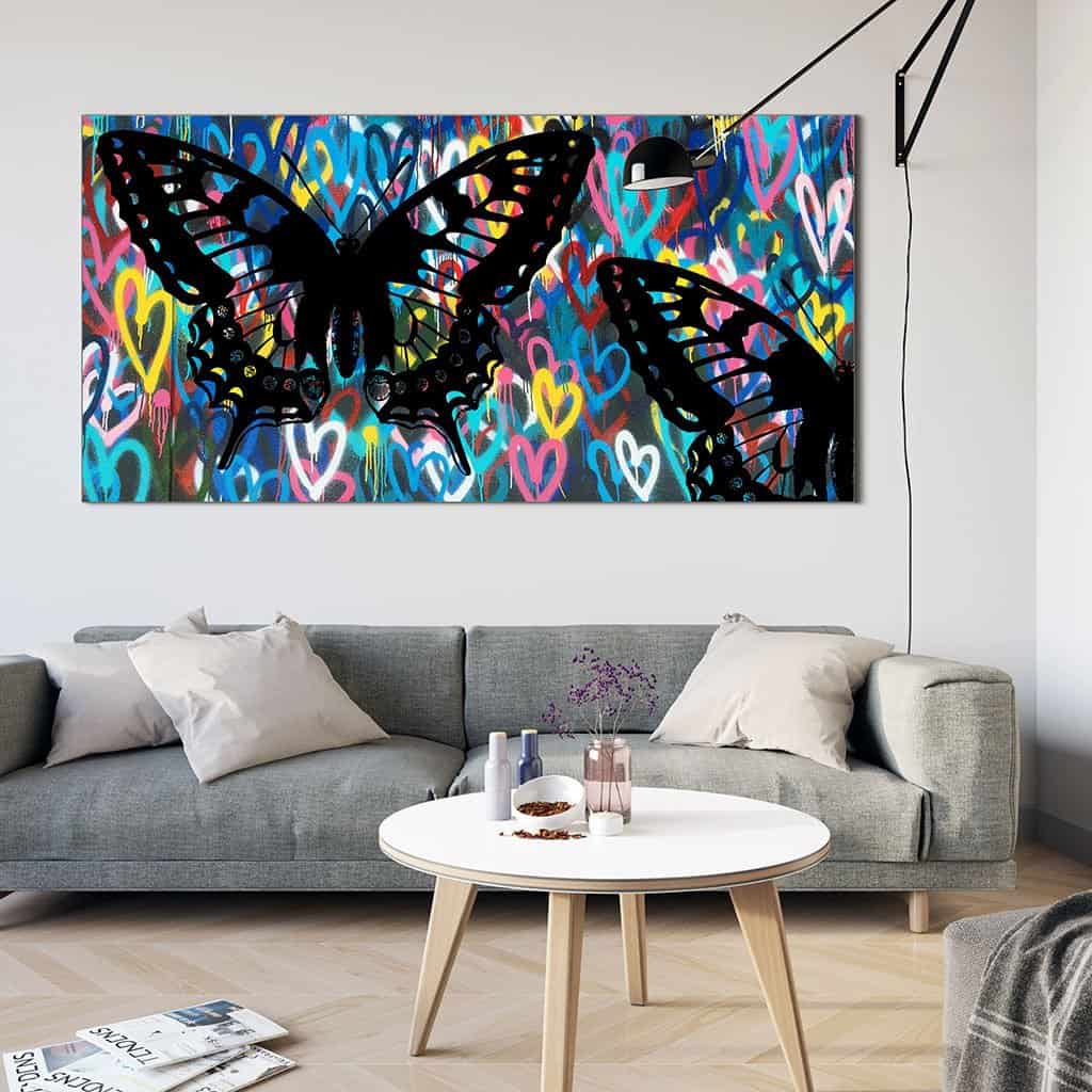 Stencil vlinders op de muur